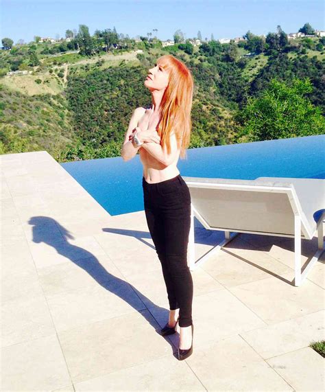 Kathy Griffin Goes Topless in Poolside Photo